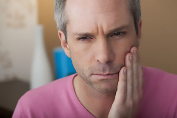 A Dentist Explains Why You Should Stop Chewing Ice